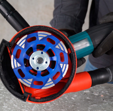 Professional grinding of construction materials with an angle grinder