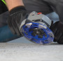 Grinding of construction materials with an angle grinder.