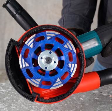 Professional grinding of construction materials with an angle grinder